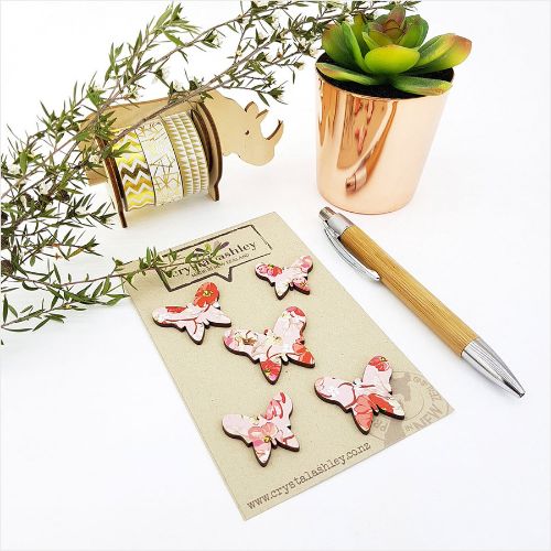 Set of five pink floral butterfly wall decor made from lightweight MDF, perfect for adding charm to any room.