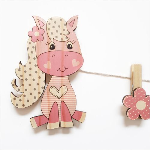 Colorful pony-themed art pegs made from eco-friendly pine veneer for displaying kids' artwork and photos.