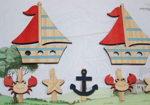 Eco-friendly Boat Art Pegs made of premium pine veneer, perfect for displaying art and photographs in style.