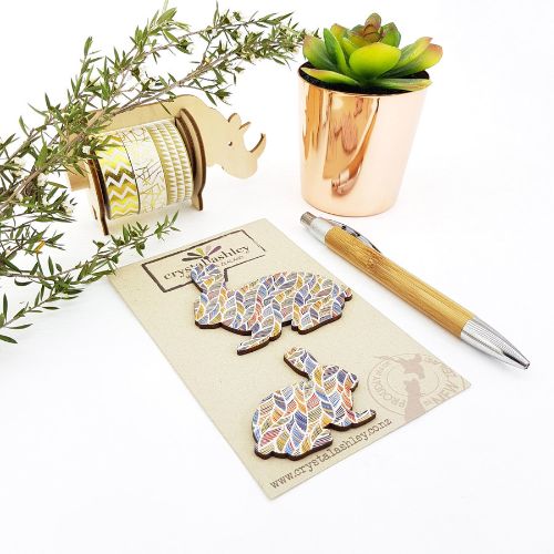 Whimsical mini wall art featuring charming bunnies and feather patterns, perfect for children's rooms and playful decor.