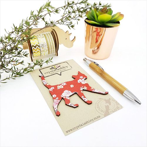 Whimsical cat-shaped wall art in vibrant red floral design, crafted from durable MDF for stylish decor.