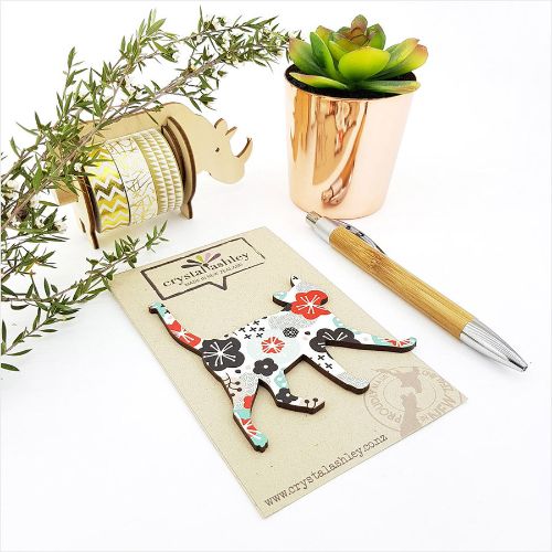 Whimsical cat-themed wall art in vibrant colors and mini shapes, perfect for adding charm to any room.