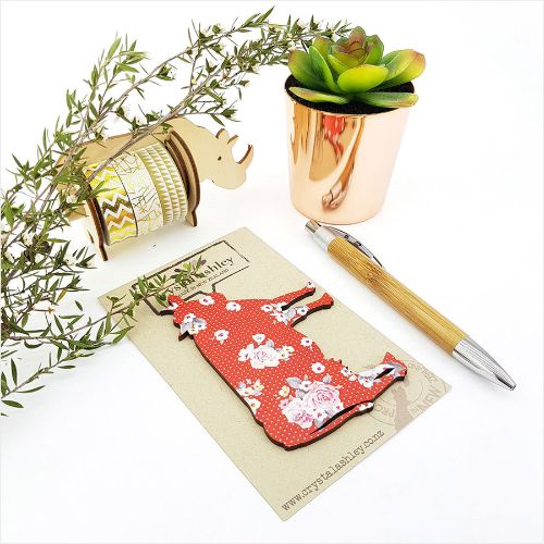 Colorful cow wall art featuring red florals, crafted from durable MDF, perfect for adding rustic charm to any space.