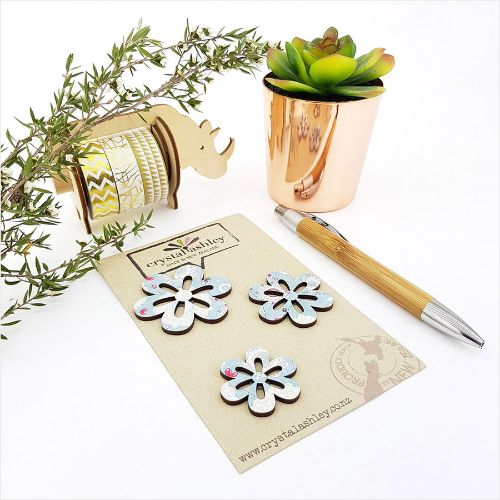 Whimsical blue mini daisy wall art, perfect for adding charm and creativity to any living space.