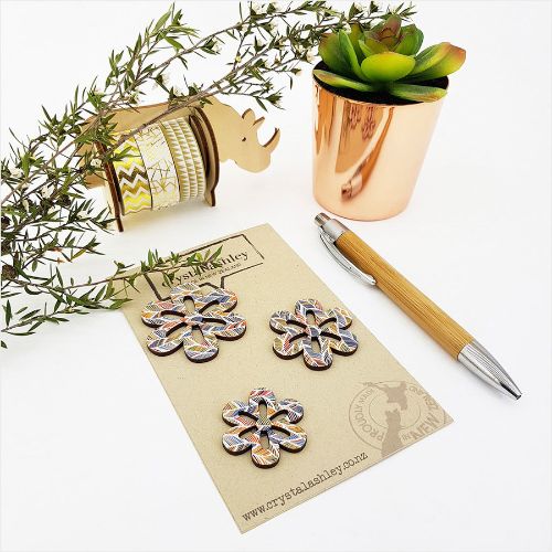 Bright MDF wall art featuring cheerful daisies and feather patterns, perfect for enhancing any living space.