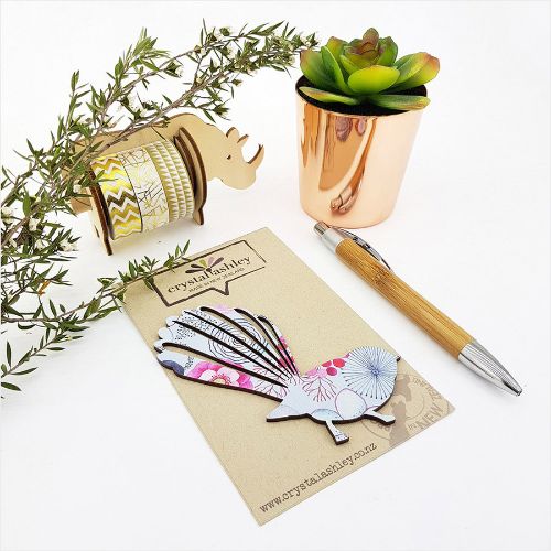 Vibrant blue floral wall art featuring a stylized fantail design, perfect for modern decor and nature-inspired elegance.