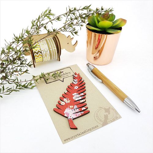 Vibrant wall art featuring fern and red floral designs on mini MDF shapes, perfect for modern home decor.