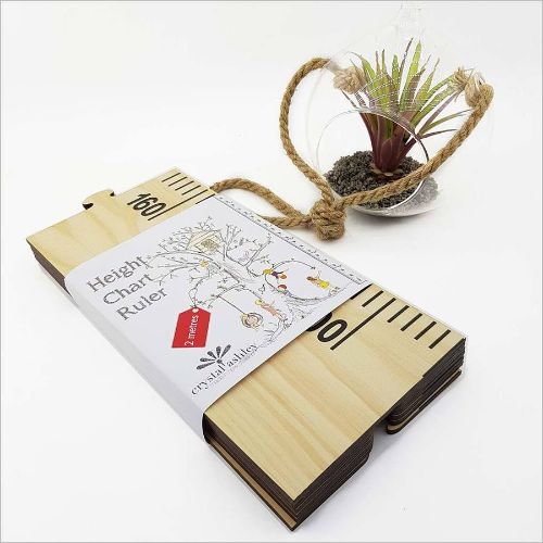 Eco-friendly growth chart ruler printed on pine veneer, featuring 7 puzzle pieces for tracking your child's height.