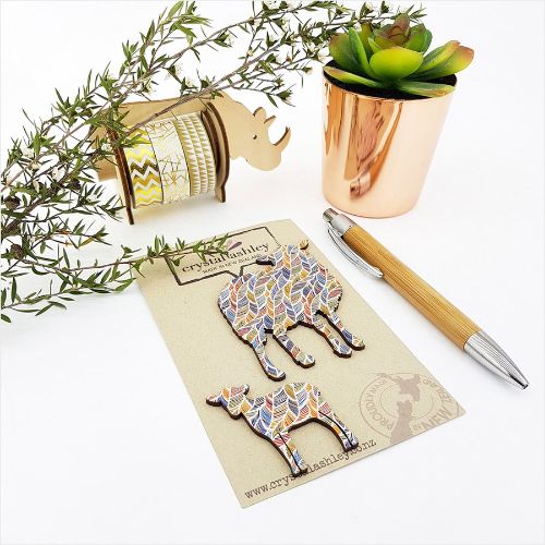 Whimsical wall art featuring a sheep family with a feather pattern, perfect for adding charm to nurseries and family spaces.