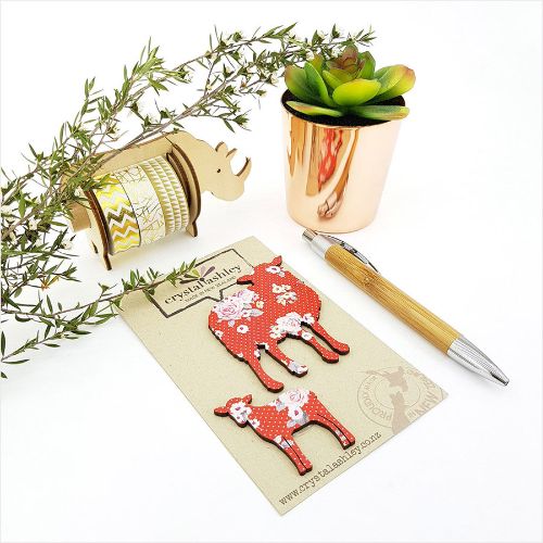 Charming sheep family wall art with red floral designs, perfect for nurseries and playful home decor.