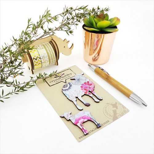 Whimsical wall art featuring a sheep family with blue floral accents, perfect for adding charm to any living space.