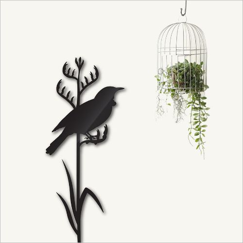 Kiwiana wall art featuring a Tui bird on tall flax, in black, crafted from durable Aluminium Composite Material.