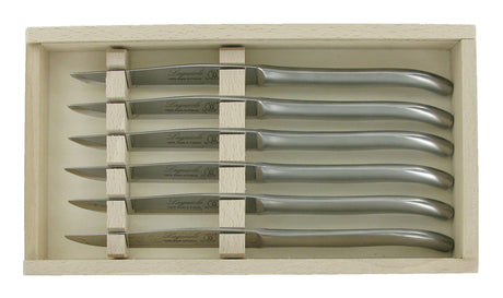 Set of 6 sleek satin finish steak knives with Laguiole design, crafted in France from stainless steel, dishwasher safe.