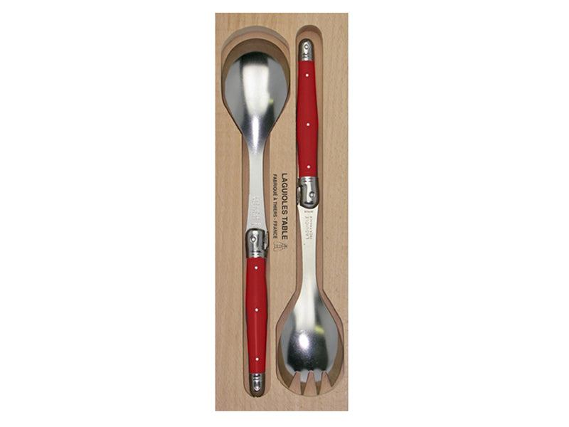 Elegant red salad server set by Andre Verdier, featuring stainless steel tines and resin handles with Laguiole bee detail.