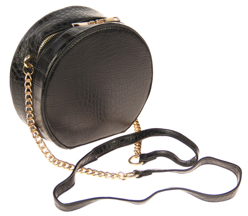 Alt text: Elegant black round box handbag in faux leather, spacious and stylish for daily essentials, perfect for any occasion.