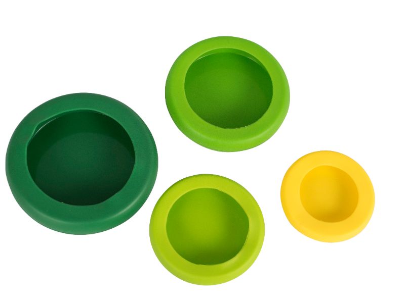 Avanti Hugger Food Saver Green Multi 4, a set of 4 vibrant silicone covers that keep fruits and veggies fresh and sealed.