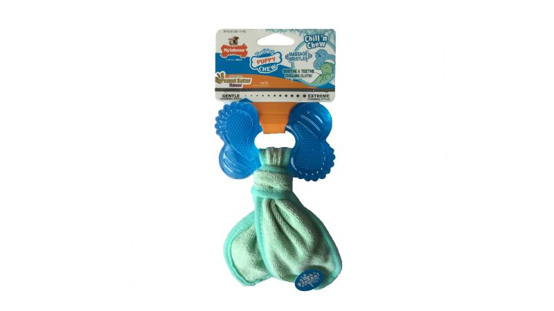 Frozen peanut butter bone for puppies, promoting healthy chewing and dental care while providing a tasty, entertaining treat.