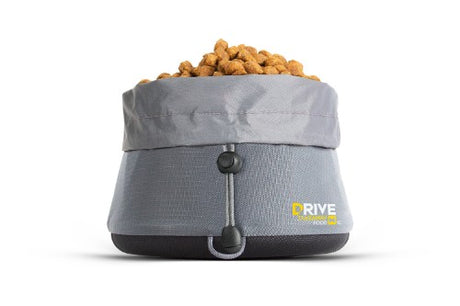 Compact, portable dog food bowl made of durable ripstop nylon with drawstring closure for spill-proof travel feeding.