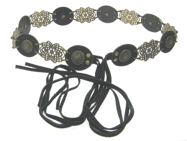 Suede belt with ant brass studs and 43cm tassels, perfect for enhancing any outfit with style and elegance.