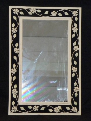 Rectangular cream mirror (50 x 75cm) enhancing décor with elegance and functionality, perfect for any room's aesthetic.