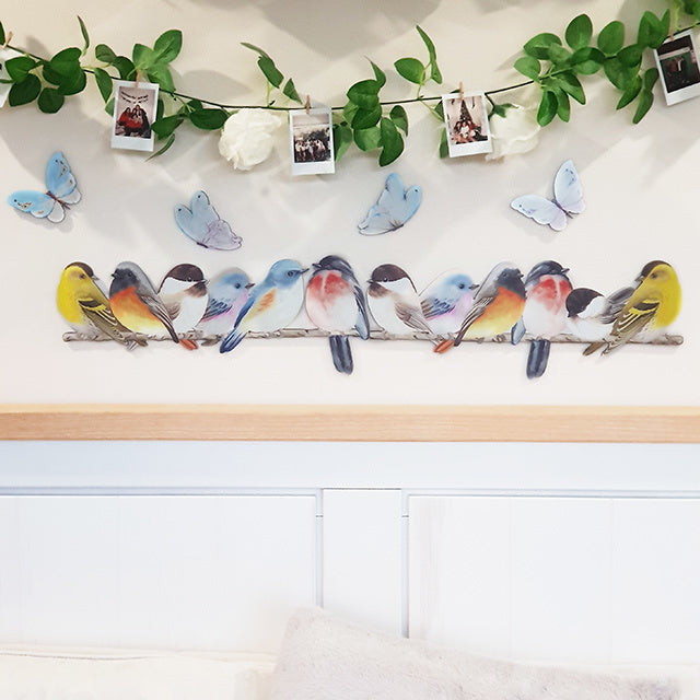 Kiwiana wall art set featuring vibrant birds and butterflies, ideal for indoor or covered outdoor decor.