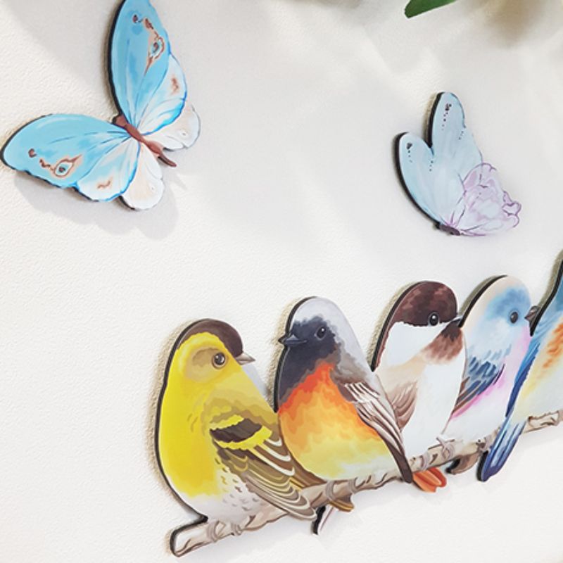 Stunning Kiwiana wall art set featuring birds on branches and butterflies, perfect for indoor and outdoor decor.