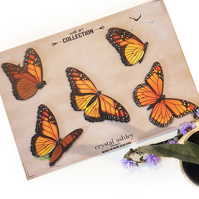 Colorful Kiwiana Monarch butterfly wall art set, showcasing five unique designs printed on durable ACM material.
