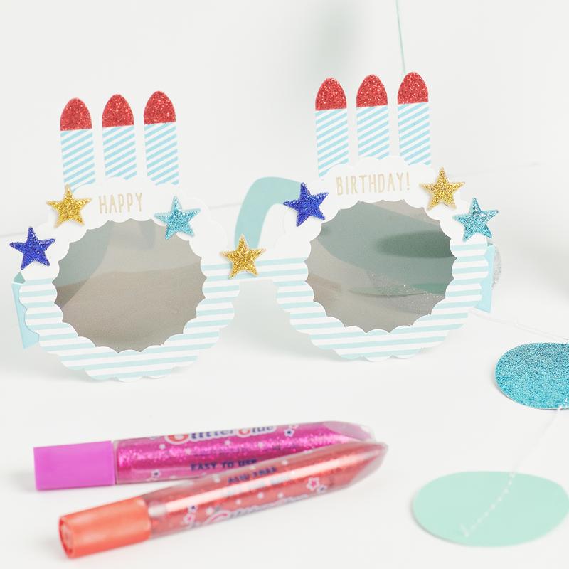 Vibrant pack of five Amos Glitter Glue tubes in gold-red, gold, gold-green, gold-blue, and red-blue for creative projects.