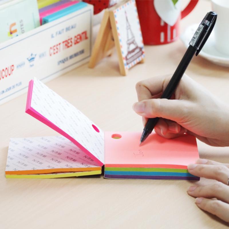 Vibrant Stick'n Magic Cube sticky notes in assorted neon colors, perfect for messages and organization, 76x101mm, 280 sheets.