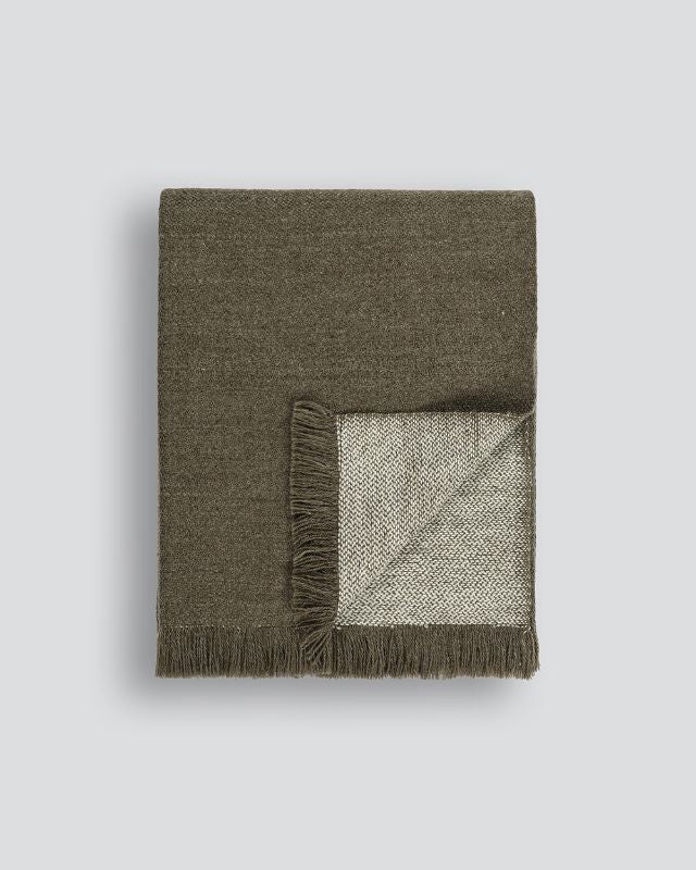 Toffee-colored Chester Throw measuring 125x150cm, made from soft wool and recycled polyester for cozy decor enhancement.
