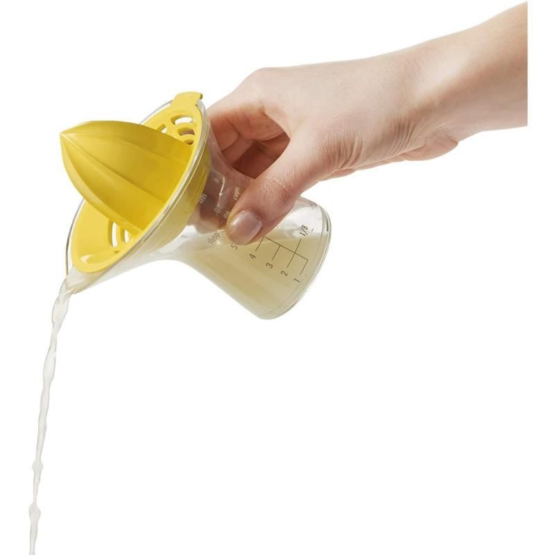 Compact OXO Good Grips Citrus Juicer with 2.5 oz cup, measurement markings, and drip-free spout for effortless juicing.