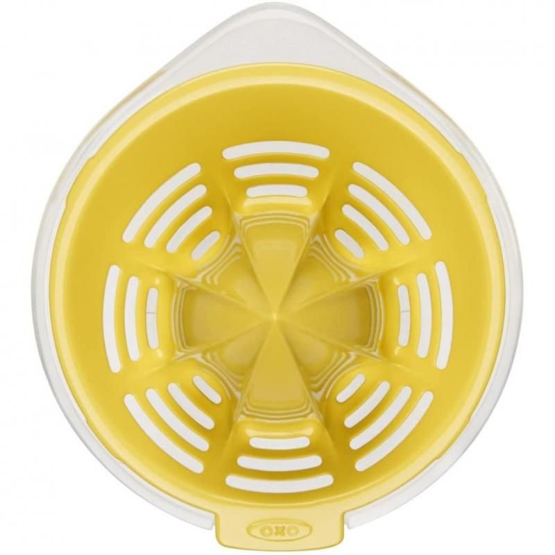 Compact citrus juicer with 2.5 oz cup, measurement markings, drip-free spout, and easy-to-clean BPA-free design.