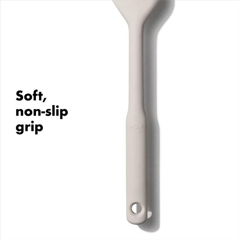 OXO Good Grips Small Spatula 24cm in Oat, featuring flexible edges and non-slip grip, perfect for mixing and scraping.