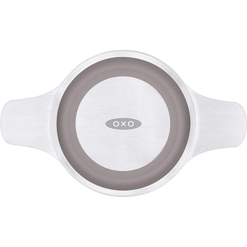 Stainless steel tea infuser basket for loose leaf tea, featuring dual-function lid and stay-cool silicone handles.