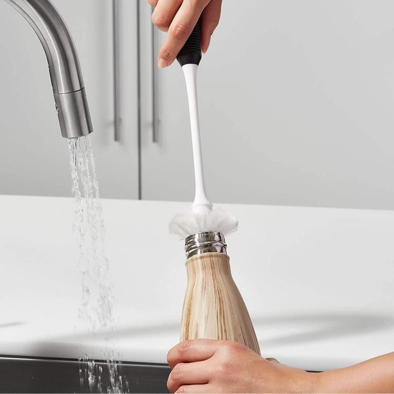 Long neck bottle brush with dual bristle head for gentle and tough scrubbing; non-slip handle, dishwasher safe, ideal for delicate containers.