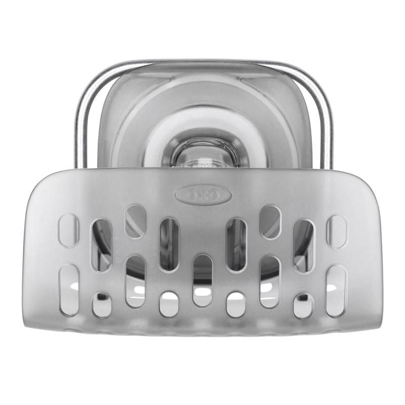 Suction sponge holder with a ventilated design for quick drying and easy access, ideal for organized kitchens.