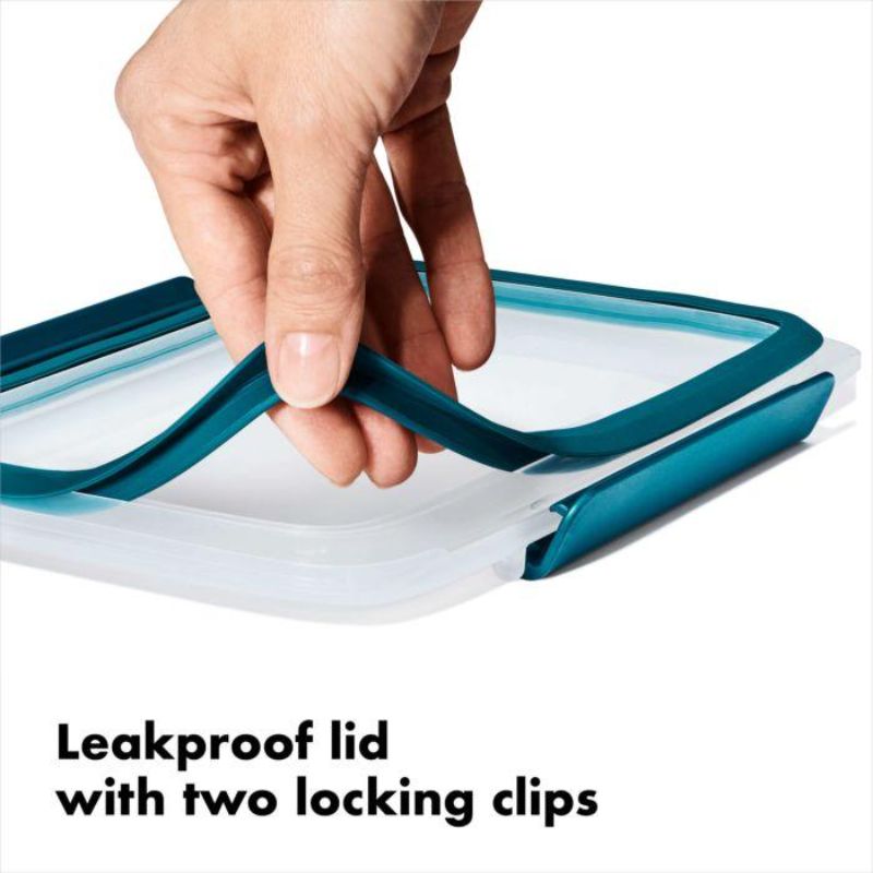Transparent OXO Good Grips Prep & Go Container with leakproof lid, stay-cool handles, perfect for meal prep and storage.