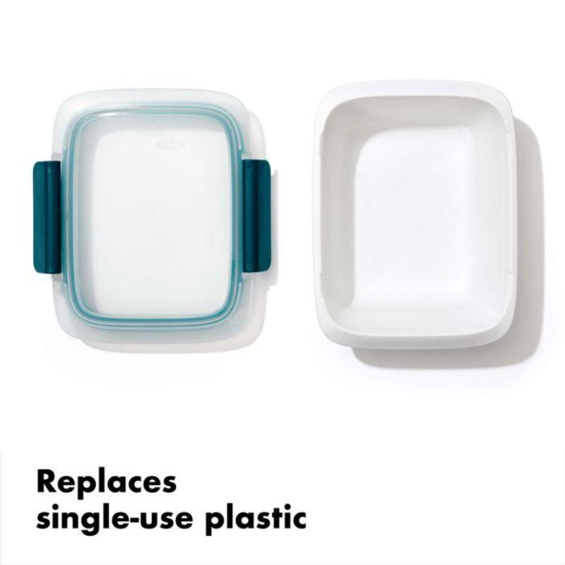 Clear OXO Good Grips Prep & Go container with leakproof lid, stay-cool handles, ideal for meal prep and storage.