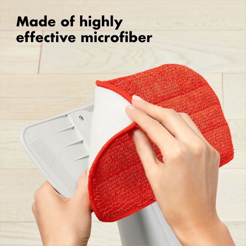 Microfiber refill for OXO Spray Mop, featuring a large head for effective dirt trapping and machine washable convenience.