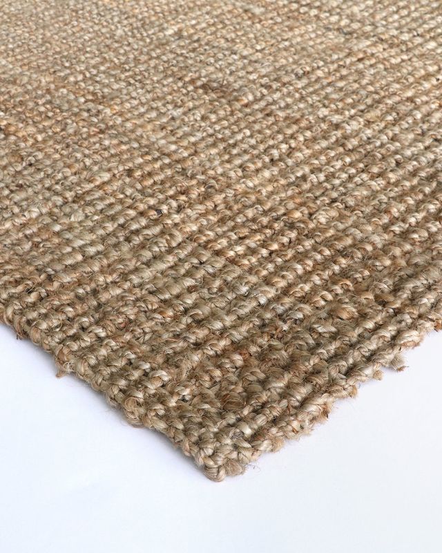 Handwoven jute rug in natural tones, 250x350cm, perfect for adding rustic charm to contemporary interiors.