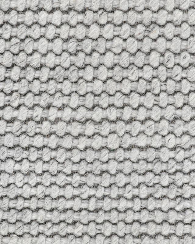 Handwoven Cyrus Floor Rug in silver, 160x230cm, features a textured knot-style weave for comfort and elegance.
