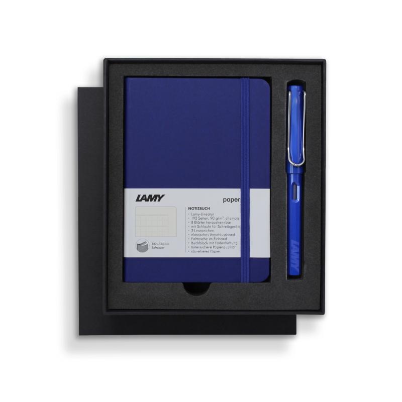 Lamy Notebook Fountain Pen Gift Set in A6 format, featuring a blue pen, softcover notebook, and elegant writing accessories.