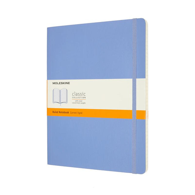 XL Hydrangea Blue Moleskine notebook with ruled ivory pages, elastic closure, ribbon bookmark, and expandable inner pocket.