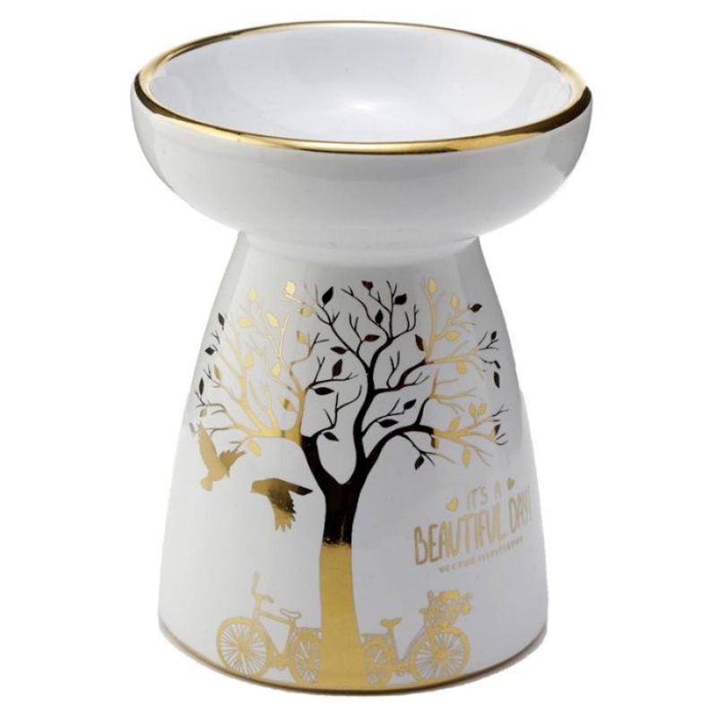 Set of 2 ceramic oil and wax burners with metallic gold tree design, creating a soothing ambiance and delightful scents.