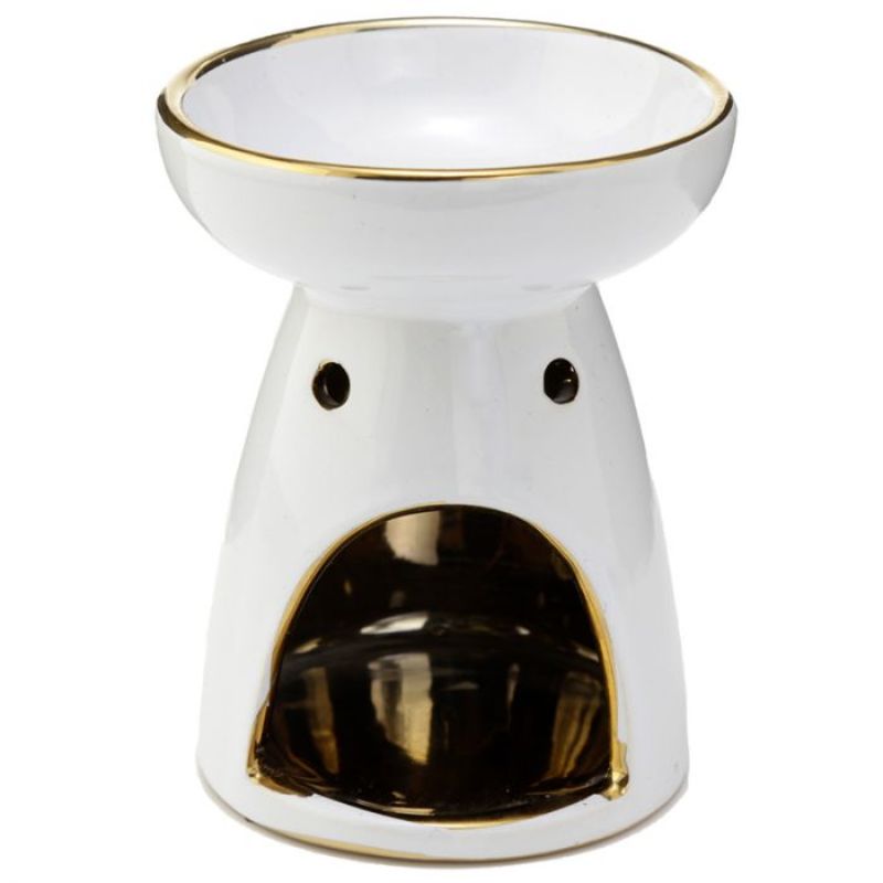 Ceramic oil and wax burners with metallic gold tree design, perfect for creating a soothing aromatic ambiance. Set of 2.