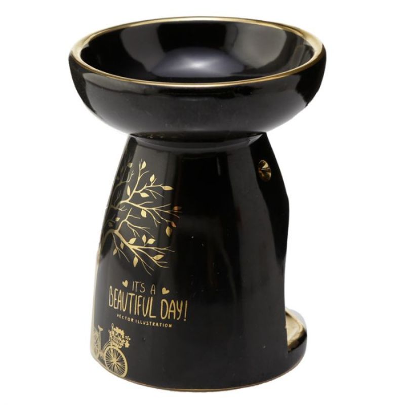 Elegant set of 2 ceramic oil and wax burners with metallic gold tree design, ideal for creating soothing aromas and ambiance.