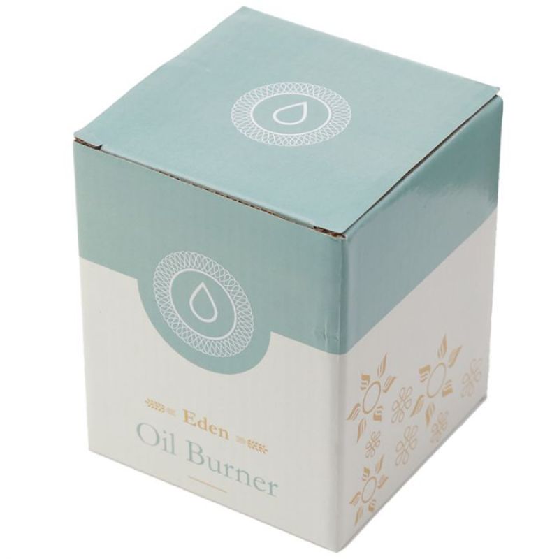 Ceramic oil and wax burner set featuring a metallic gold tree design, perfect for creating soothing fragrances at home.