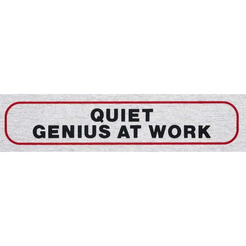 Self-adhesive brushed aluminum sign reading "Quiet Genius At Work", perfect for promoting focus in any workspace.