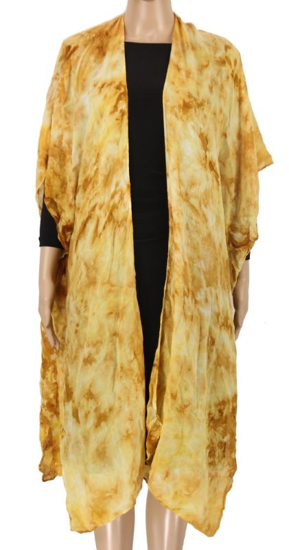 Stylish mustard tie-dye cape, lightweight and versatile, perfect for layering and expressing individuality in any outfit.