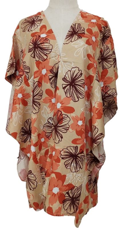Vibrant orange Victoria Ruffled Side Cape, 100% viscose, flowy silhouette, perfect for layering over outfits.